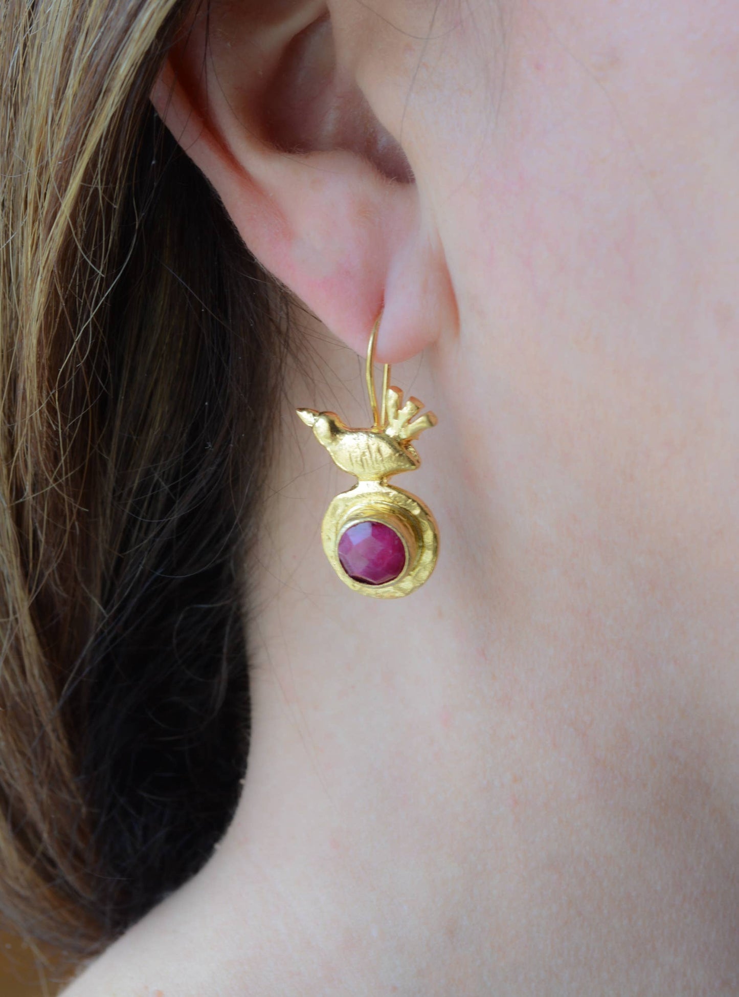 Gold plated bird earring with ruby