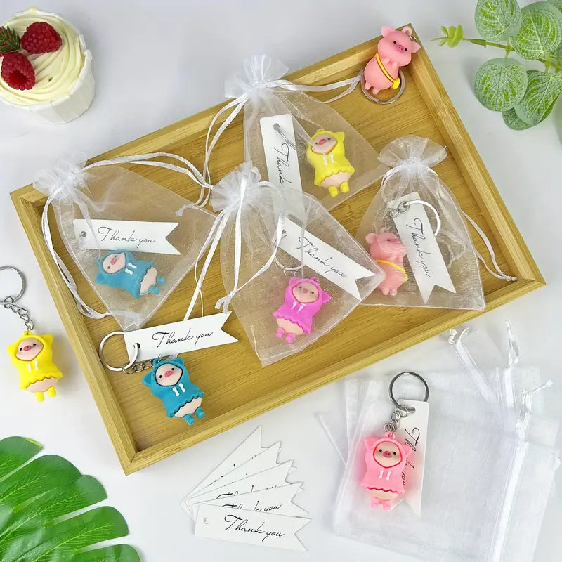 Raincoat pig keychain