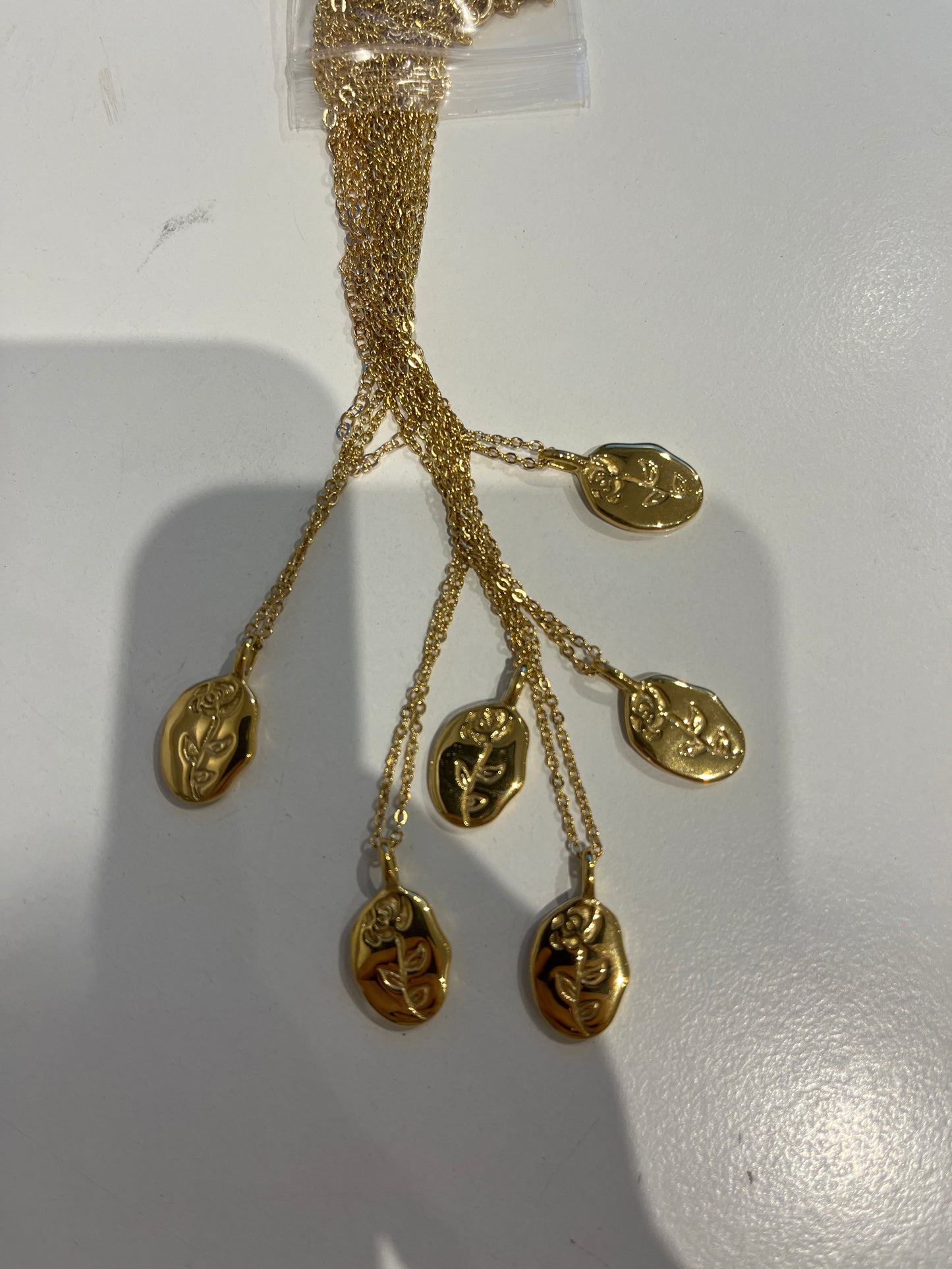 Gold Oval Pendant with Rose Print Necklace