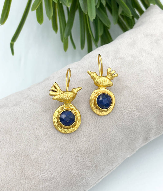 Gold plated bird earring with sapphire