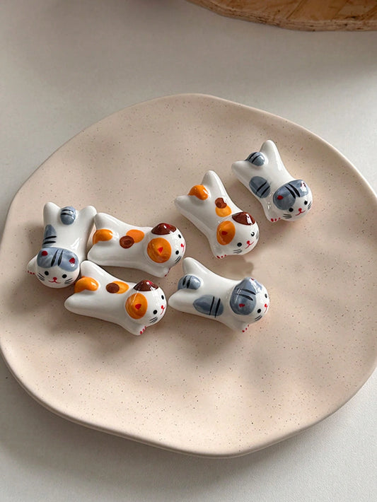 Cat chopstick holder