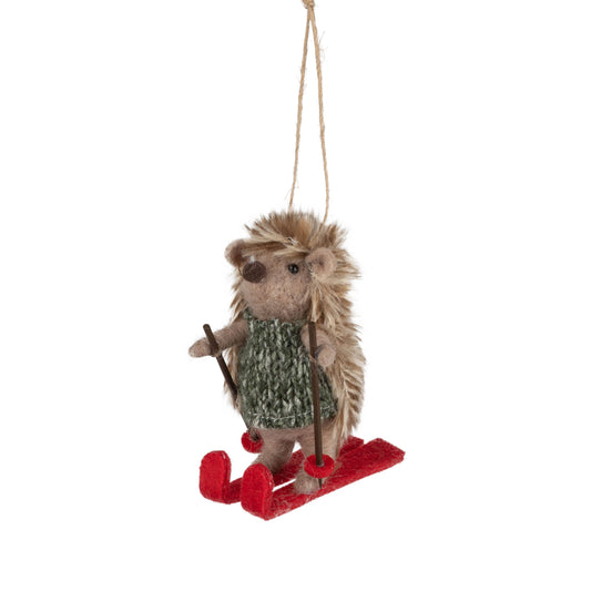 A12939:Felt hedgehog skiing red skis green outfit 4.25 in