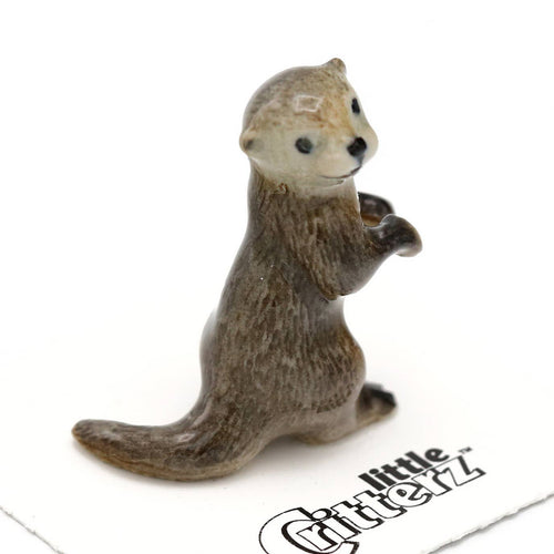 Nimble Asian Otter Porcelain Miniature - Front & Company: Gift Store