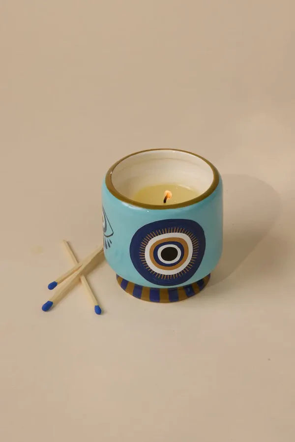 A Dopo 8 oz Handpainted "Eye" Ceramic Candle - incense & Smoke