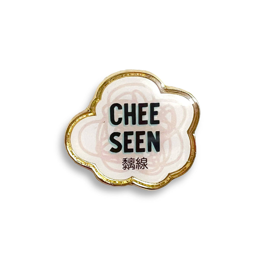 Chee seen lapel pin