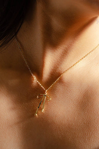 Bad to the Bow Necklace - 18K Gold Plated Necklace - Front & Company: Gift Store